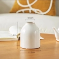 Minimalist white ceramic vase with distressed brown rim, size 14cm height by 11.5cm width - Retro Vase Small