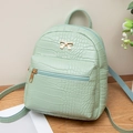 Light green crocodile pattern mini backpack with metal bow decoration and zipper pocket - Light Green