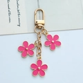 Pink enamel flower keychain with gold-plated metal chain and triple floral charms - Rose Red