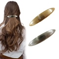 Oval brushed metal spring hair clips shown in gold and silver finishes on model - Set 15 (2 Pieces)