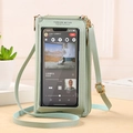 Mint green touchscreen crossbody phone bag with pebble leather texture and adjustable strap - Green