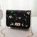 Fashionable black PU leather crossbody bag with floral embroidery and golden chain strap - Black