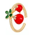 Macro detail of gold open ring featuring red cherry enamel and shimmering cubic zirconia stones - Adjustable Open / Gold Cherry Rhinestone Style