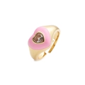 Detailed view of pink enamel heart ring with clear zircon set in gold plating - Adjustable Open / Pink