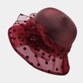 Detail of burgundy organza flower and black polka dot mesh on elegant summer sun hat - One Size / Burgundy