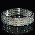 Macro shot of silver bridal bracelet featuring four rows of sparkling rhinestones - 4 Row Silver Clear Rhinestone Bracelet