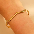 Fashionable gold wave pattern stainless steel open bangle with a polished mirror finish - Polished Mirror Wave (S-330)