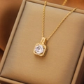 Elegant gold titanium steel necklace with square pendant and centered round zircon stone - Golden Mini Bag Necklace (XL1481-6)