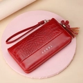 Long red crocodile pattern leather wallet with wristlet strap and tassel charm - Burgundy