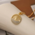 Collana con ciondolo albero della vita dorato e zirconi su elegante base color crema - Albero della Vita (24131)