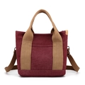 Large burgundy canvas tote bag with adjustable brown straps and multiple compartments - Purple Coffee