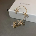 Golden flower ear cuff with sparkling diamonds and pearls in a refined floral design - Gold Pearl Floral Single Ear Cuff Style