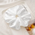 Oversized pearl white satin hair scrunchie with elegant pleated fabric texture - White