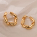 Irregular geometric gold-plated twisted earrings on soft beige fabric for a modern look - Gold