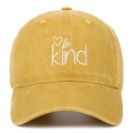 Close-up of Be Kind embroidery and heart on yellow washed canvas baseball cap - Yellow