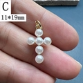 Macro detail of a 11x19mm gold pearl cross pendant for DIY jewelry making - 11*19mm