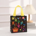 Detail of black non-woven birthday gift bag with yellow handles and colorful lettering - 9005-1 (Black-HAPPY BIRTHDAY)