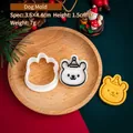 Mini puppy cookie cutter for Christmas baking featuring cute holiday hat dog design - Dog