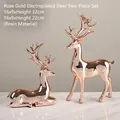 Modern rose gold elk statues set of two with glossy electroplated finish for home decor - 2-Piece Set (Standing + Sitting) / Electroplated Champagne Pair