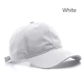 Classic white cotton baseball cap with adjustable strap and curved brim in side view - Adjustable / White