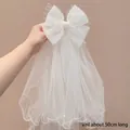 White princess bow hair clip with 50cm long tulle veil and delicate pearl chain - Pearl Floating Veil