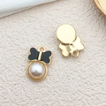 Golden bow jewelry pendant with white pearl inlay and metal base for DIY earring crafts - Bow Pearl (11920)