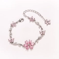 Silver flower bracelet with pink teardrop gemstones and adjustable heart charm chain - Pink-White Gold