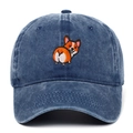 Close-up of the detailed corgi dog embroidery on the dark blue washed denim baseball cap - Navy Blue