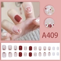 Sweet red and white floral press-on nails with polka dots in a short round shape - Red and White Floral Polka Dot Style (A409) / 24Pcs/Box (With Glue)