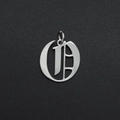Macro shot of silver Gothic letter D pendant with connector ring on black texture - Letter O