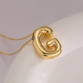 Minimalist gold balloon letter G pendant necklace with 3D puffy design on a thin chain - Letter G