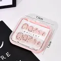 Pink press-on nail storage box with floral art nails in a clear 7.5cm display case - Pink 7.5*7.5cm 1pc