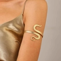 Elegant gold-tone serpent-style arm cuff featuring unique textured suction cup patterns - Octopus Tentacle Style (10604)