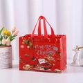 Red non-woven Christmas gift bag with Santa and reindeer patterns and Merry Christmas text - Elk Sleigh Red