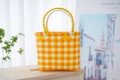 Handwoven checkered picnic bag in bright orange and yellow hues with round handles - Plain Plaid / Orange Yellow White
