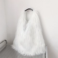 White faux fur fluffy shoulder bag with Y2K style aesthetic displayed on a metal rack - Pure White