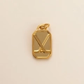 Detailed close-up of a 18k gold plated rectangular pendant with embossed hockey sticks - Hockey Stick Pendant