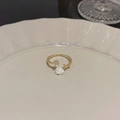 Detailed view of branch-shaped gold ring featuring a white rose and zircon accent - Gold - White Rose Single Diamond