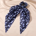 Detail of silk hair scrunchie with blue evil eye print on black fabric backdrop - 9# Black Blue Circle Eye