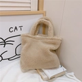 Detail of plush beige tote bag made of soft faux fur on a cozy home lifestyle background - Beige Apricot