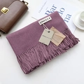Deep purple cashmere-like scarf with fringe and 'different' label on a white table - Rose Purple / 200cm