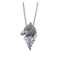 Detailed view of silver wolf head pendant with intricate flame pattern on box chain - Antique Silver
