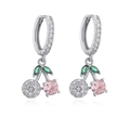 Detail of silver cherry earrings with green zircon leaves and pink crystal stone - Silver Colored Zircon Cherry Earrings