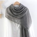 Detailed texture of dark grey cotton linen scarf with soft fringe edges and crinkled design - Dark Gray