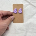 Festive purple acrylic Christmas tree stud earrings displayed on a brown kraft card - Stud Earrings / Violet