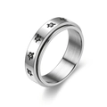 Macro view of stainless steel spinner ring with engraved sea turtle patterns. - Size 6 / Rotating Turtle (6038064526143)