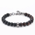 Macro detail of 8mm matte black stone and tiger eye beads with steel spacers - Red Tiger Eye Bracelet