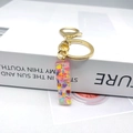 Detail of letter I keychain with colorful heart sequins in transparent resin material - Letter I Lobster Clasp Keychain