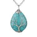 Handmade Tree of Life wire wrapped turquoise crystal pendant necklace on white background - Turquoise Silver