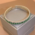 Detail of double-row gold-plated cuff bracelet featuring green and white zirconia pavé - Bangle - Green - Square